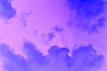 A vibrant and colorful abstract sky with fantasy clouds. A dreamy, surreal background texture for creative design projects.