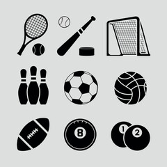 Collection of various sports equipment and balls on a light background