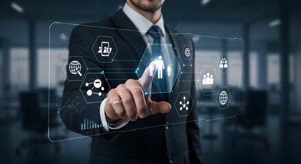 A businessman in a suit interacting with a futuristic holographic interface, touching a digital display.