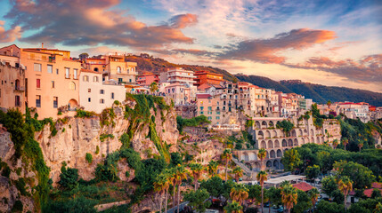 Exciting evening cityscape of Tropea town, Italy, Europe. Picturesque summer sunset on...