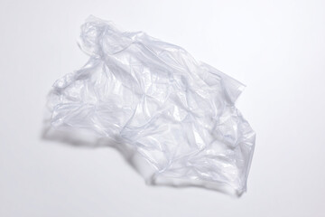 a white plastic bag on a white surface