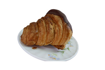 Delicious Chocolate Topped Croissant Served on a Floral Patterned Plate