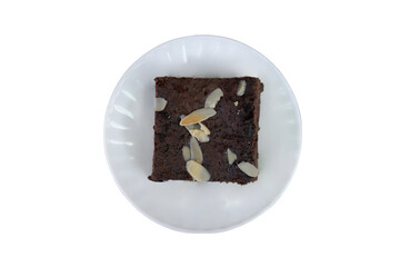 Chocolate Brownie Square Topped with Almond Slices on White Plate