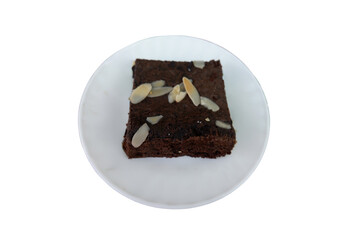 Delicious Chocolate Brownie with Almond Slices on White Plate