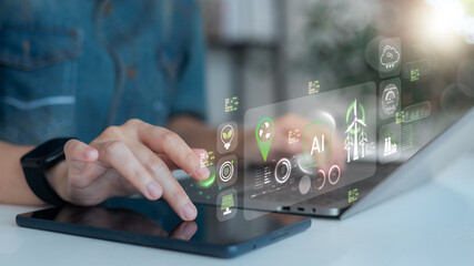 Close-up hand using a tablet with an AI interface managing green energy, wind power, and CO2 reduction, showing innovation in clean technology and sustainability.