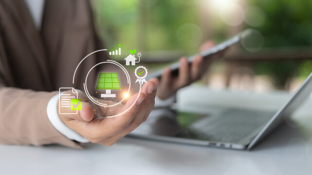 Close-up hand holding certified solar energy icon for sustainable business, showing clean energy strategy, eco-friendly innovation, and environmental responsibility.