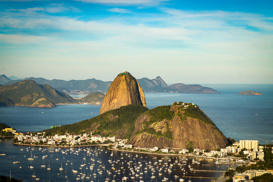 Rio de Janeiro, RJ, Brazil, 08/03/2025 - Sugar Loaf and Urca hills and Botafogo cove at sunset, seen from the Dona Marta viewpoint