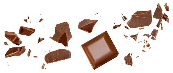 Chocolate explosion isolated on white. Broken chocolate bar pieces flying in the air. Top view. Flat lay. Chocolate levitation 