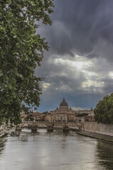 St. Peter's Basilica and Ponte Sant'Angelo over Tiber River in Rome, Italy