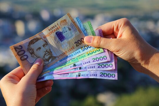 Albanian lek money in hand