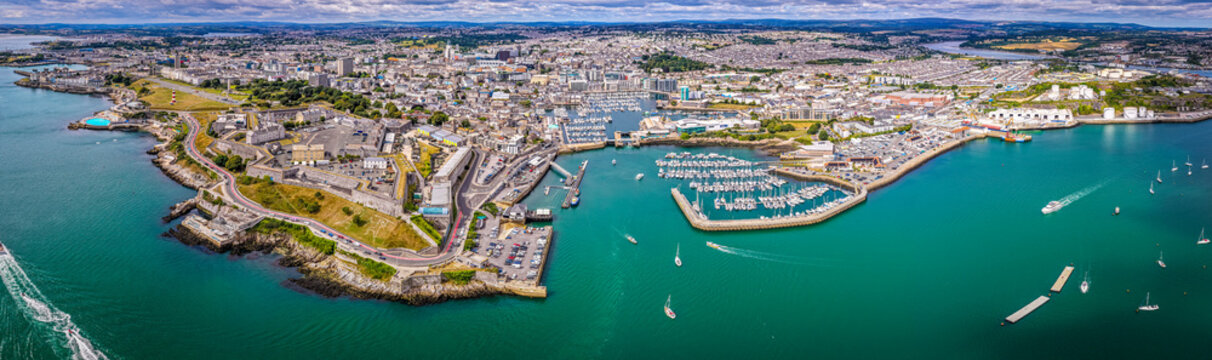 Aerial view of Plymouth Hoe and Royal Citadel along the waterfront in Plymouth, England, with cityscape and marina in the background
