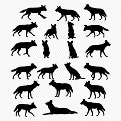 A collection of black silhouettes of a wild dog, like a wolf or coyote, in various dynamic and static poses.