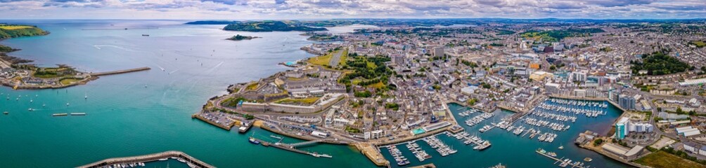 Aerial view of Plymouth Hoe and Royal Citadel along the waterfront in Plymouth, England, with cityscape and marina in the background