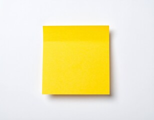 A single, blank, yellow sticky note rests on a white background.