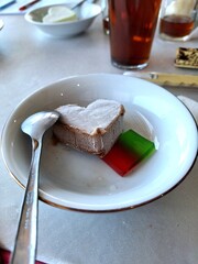 dessert chocolate ice cream in the shape of a heart and colorful agar agar