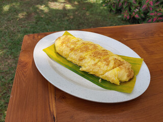 Egg Roll Omelette or Telur dadar gulung or Tamagoyaki or Japaneses egg roll. Gyeran Mari or Korean Rolled Omelette. fried egg