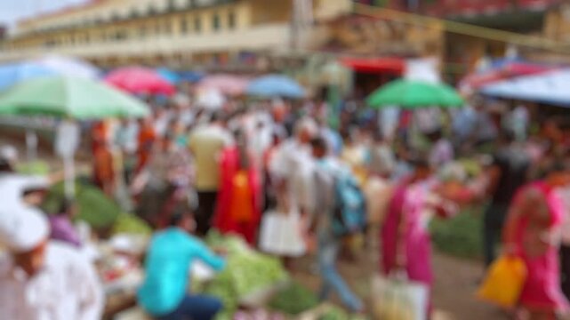 Bokeh view of street vegetable market in Bangalore, India. Blurred background footage.