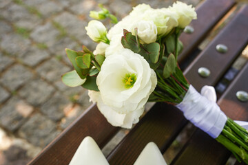 White Bridal Bouquet on Wooden Bench – Wedding and Marriage Concept