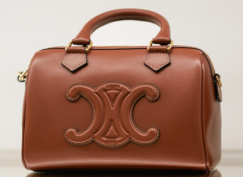 Celine brown leather handbag with golden Triomphe logo.Milan - Italy,02 August 2025