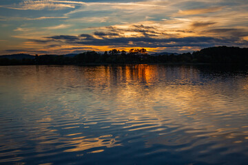 Naklejka premium Ripples and Reflections after the sunset