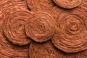 Fototapeta premium Texture of red background. Abstract fabric texture or pattern, close-up of orange thread, macro shot of textile surface, wallpaper template for banner, website, background, poster