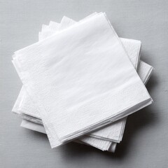 Stack of white paper napkins