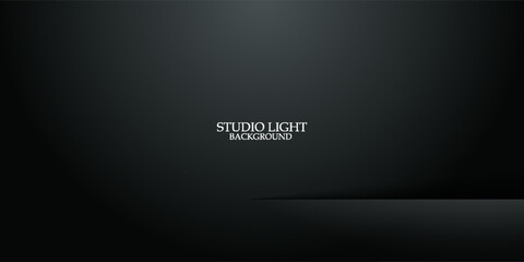 Fototapeta premium Abtract studio light background. Black empty room with one spotlight. Dark studio can used for background and display brand or product. Black edition. Vector 3d illustration