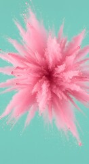 Obraz premium A captivating explosion of pink powder against a teal backdrop, creating a dynamic and abstract image that conveys energy and artistic expression