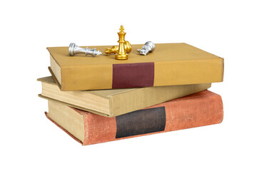 Gold king checkmates silver. Victory, success, and winning business strategy concept on books. isolated on white background with clipping path.