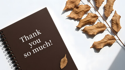 Expressing sincere gratitude with a stylish notebook and autumn leaves, thank you so much