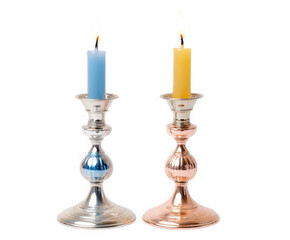 Two lit candles in ornate decorative candle holders isolated on transparent background