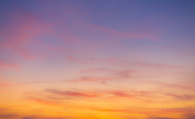 Colorful sky and clouds backdrop in the morning,Beautiful Vivid sky painted by the sun leaving bright golden shades.