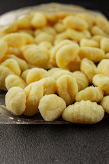 Gnocchi raw potato dough snack fresh delicious gourmet food background on the table  rustic food top view copy space vegetarian food