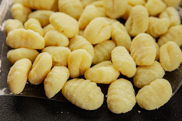 Gnocchi raw potato dough snack fresh delicious gourmet food background on the table  rustic food top view copy space vegetarian food