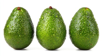 Three avocados, bright green, covered in water droplets, arranged in a horizontal row against a plain white background