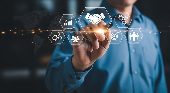 Photo of business people shaking hands with digital interface and business icons