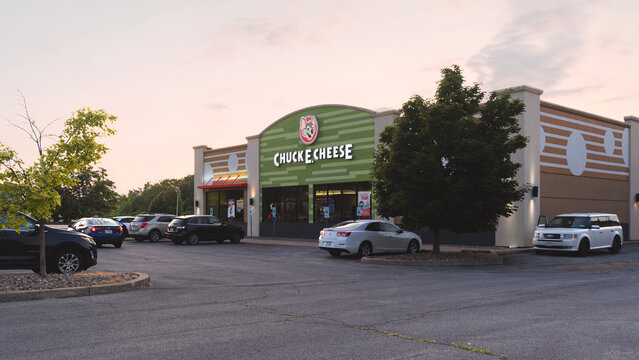 Rome, NY - Jul 30, 2025: Ultra-wide view of Chuck E. Cheese, is a chain of family entertainment centers known for combining pizza, arcade games, amusement rides, and musical shows, founded in 1977
