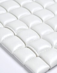 Fototapeta premium White quilted leather tiles