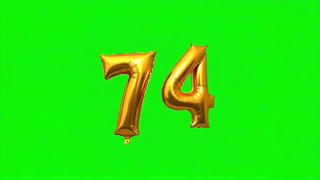 Shiny gold number 74 balloons floating, perfect for celebrations, birthdays, anniversaries, or sales events.