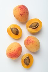 Fresh ripe apricots on white background, flat lay
