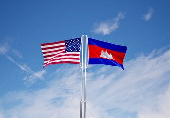 flags of  cambodia and United States of America over blue sky background.