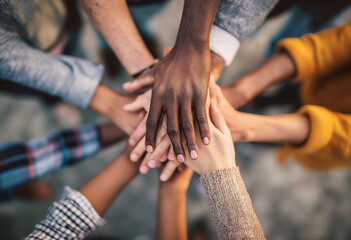 An overhead shot of diverse people from various backgrounds coming together in unity