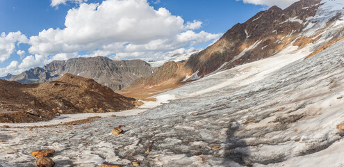 View of Gepatschferner and Punta del Lago Bianco at the Italian Austrian border from Barba d'Orso glacier. The glacier is in rapid retreat caused by global warming. Vallelunga, Alto Adige, Italy
