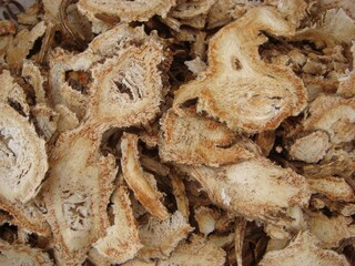 Ostericum koreanum, Namganghwal sliced dried root used in anti-inflammatory herbal medicine. Photographed in Korea.