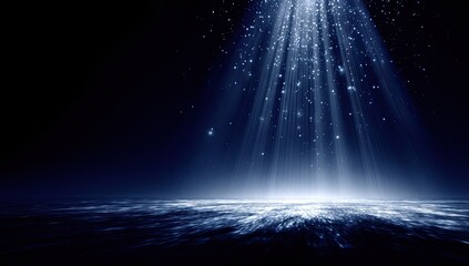 Light beams descend on a dark, reflective surface