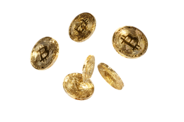 Bitcoin coins falling on black background