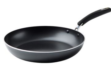 Non stick frying pan with black handle isolated on black background