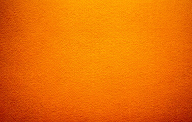 Orange background made of soft felt fabric.The orange color of the clothes