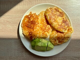 juicy delicious pancakes with avocado for breakfast. High quality photo