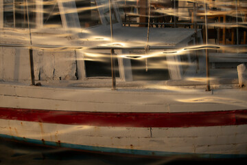 Aesthetic seaport background. Harbour with boats. Double exposure of the ocean and fishing boat. Abstract design